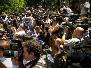 Large Group of Reporters with Cameras in Central Park Image medium_1805323291