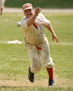Man pitching a baseball